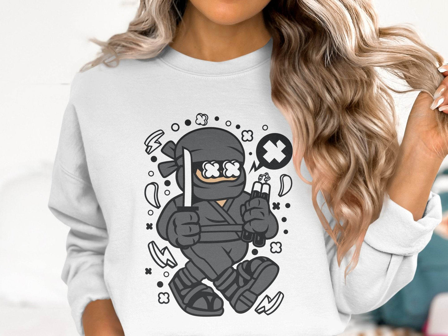 Ninja Cartoon Character with Nunchucks Graphic Sweater - Design & Vybe