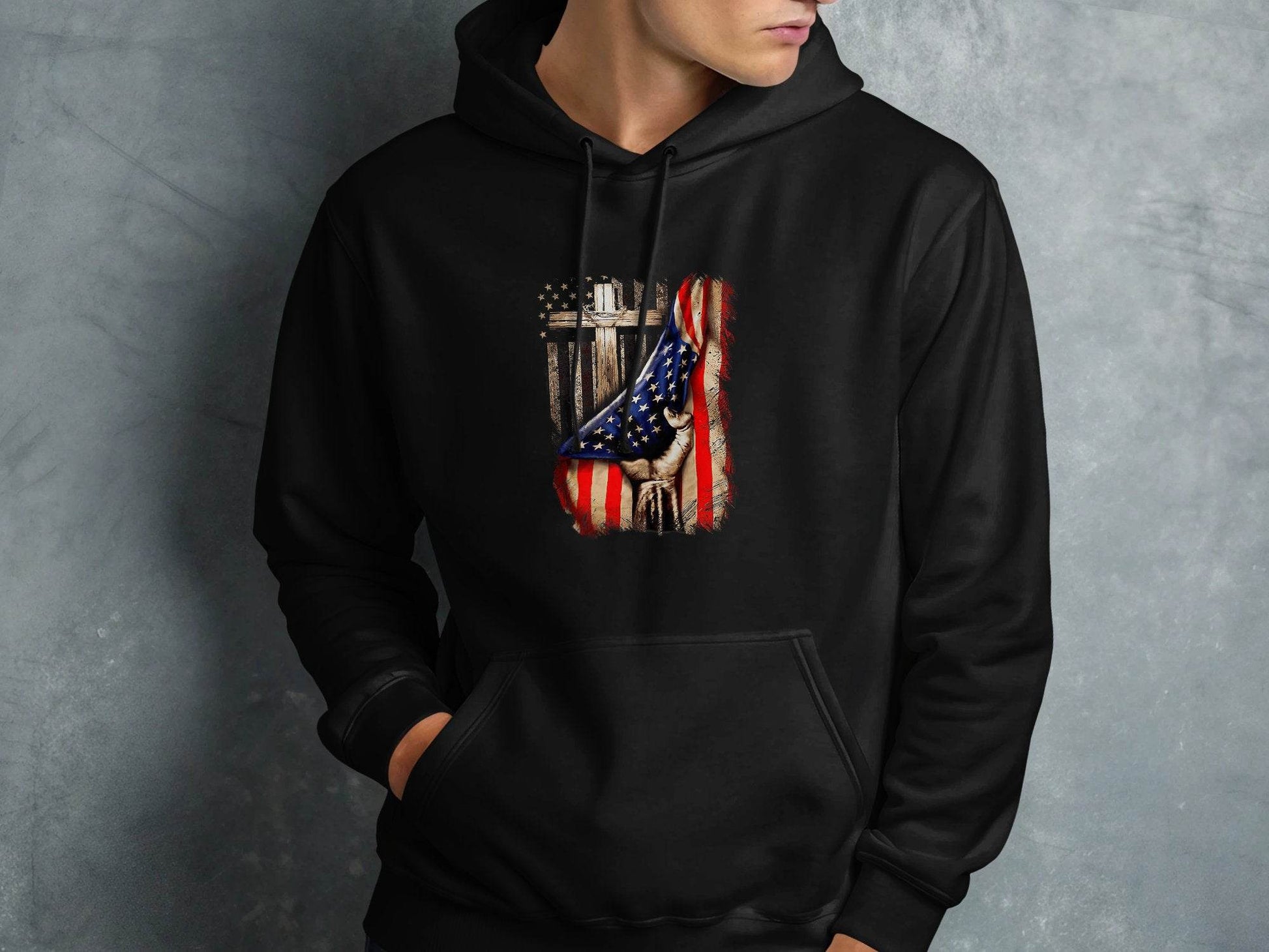 American Flag Plus Cross Held in Hand Design Hoodie - Design & Vybe